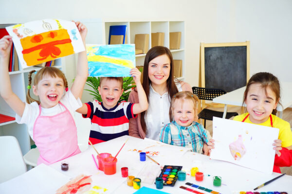 Kids painting on an art class at school